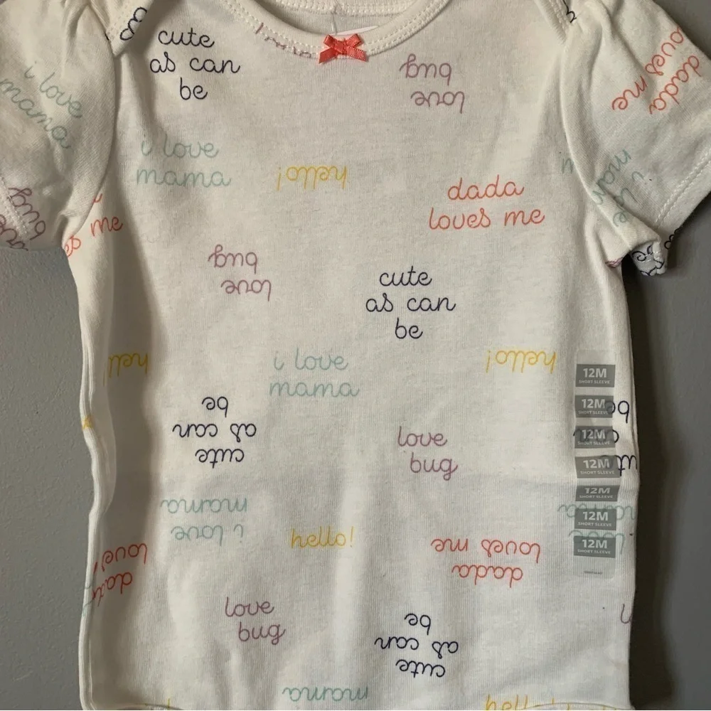 NWT. CARTER’S White Baby Onesie with Colorful Text